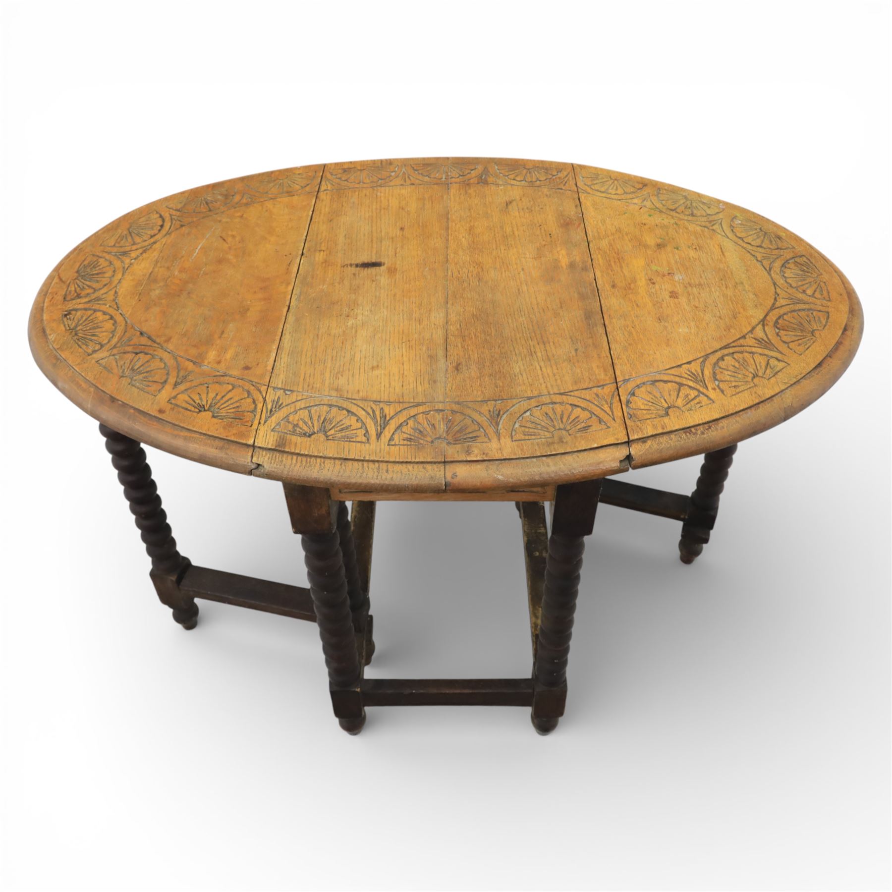 19th century oak country tables, comprising a oak country tripod table, circular top on a turned baluster stem issuing three cabriole supports with pad feet (H 71cm, Dia 80cm) carved oak gate leg table, the rectangular drop-leaf top decorated with foliate carving, raised on turned legs united by stretchers, with gate leg action (H 71cm, W 73cm, D 44cm)