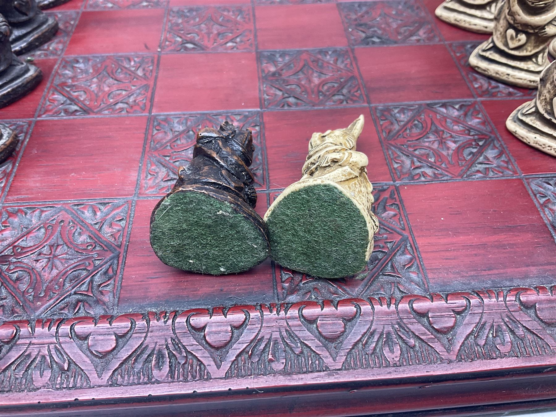 Alice in Wonderland themed chess set, with a complete set of composite figures, modelled as characters including Alice, Tweedledum and Tweedledee, the White Rabbit and the Mad Hatter, etc