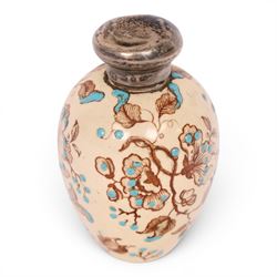 Victorian silver topped porcelain scent bottle, hallmarked Cornelius Saunders & Frank Shepherd, Birmingham, 1888, of ovoid form, decorated with floral sprigs upon a cream ground with blue enamel detail, H7cm