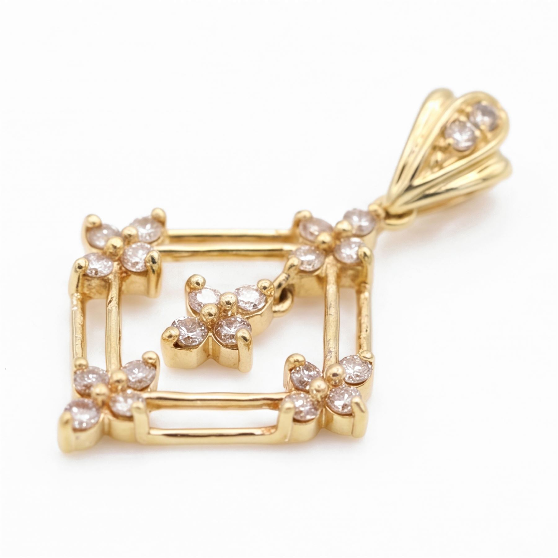 18ct gold diamond lozenge pendant, set with twenty round brilliant cut diamonds within an openwork frame, to a diamond set bale