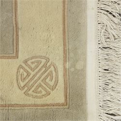 Chinese wool rug, the pale grey central field decorated with two stylised dragons, flaming pearls and cloud scrolls, within a cream border of shou medallions and geometric motifs, with cotton fringe ends