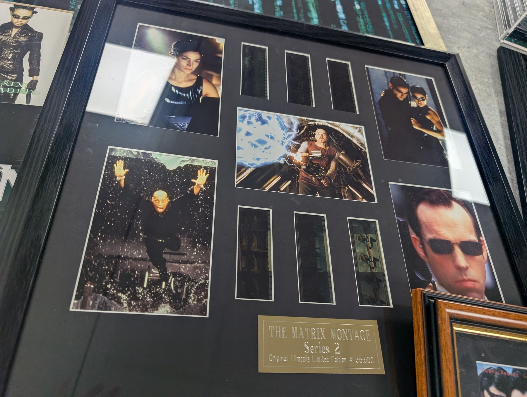 Signed The Matrix montage print with spurious signatures, together with framed Matrix prints and film cells and a limited edition ten DVD box set with bust