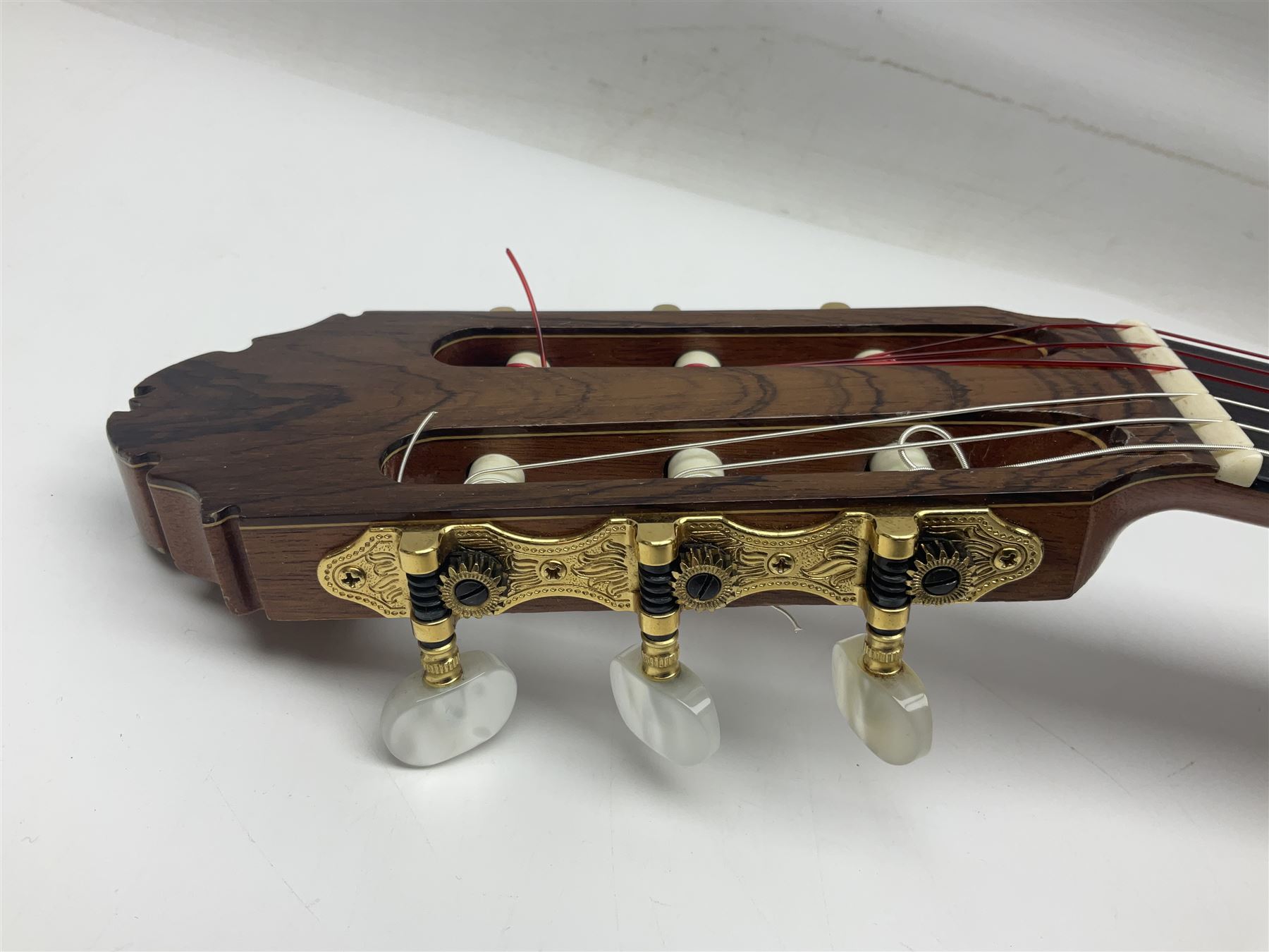 British hand made classical acoustic guitar by Huw Morgan with Indian rosewood back and sides and spruce top; bears label dated May 1998; L100cm; in Tribal Planet lightweight carrying case