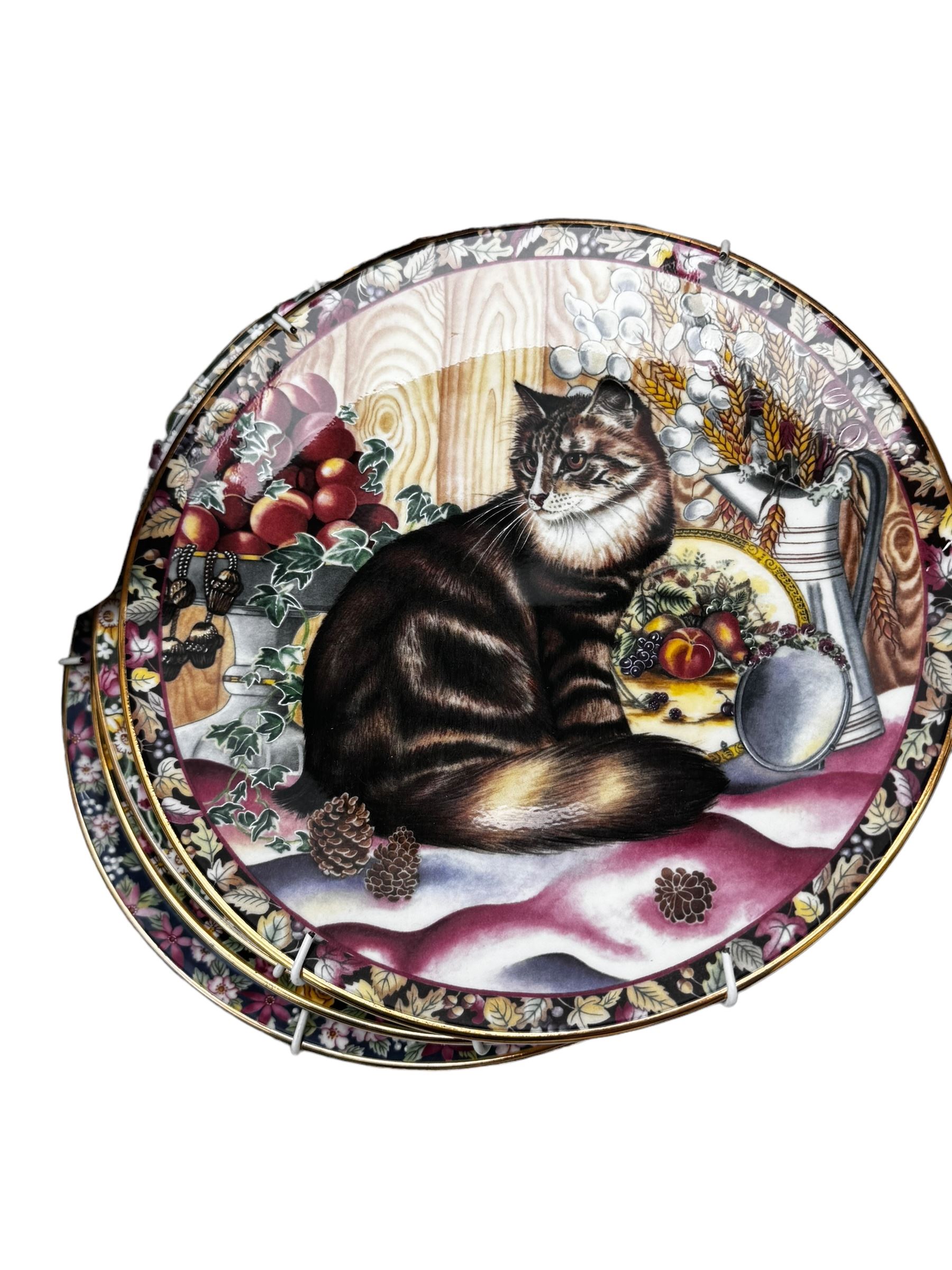 Five ‘The Juliana Collection’ figures, Capodimonte figure of a cobbler, four decorative cat plates, another decorative plates and Aynsley china