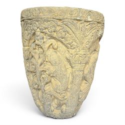 Cast stone Romanesque design urn of tapering form, decorated in relief with motifs of zoom...