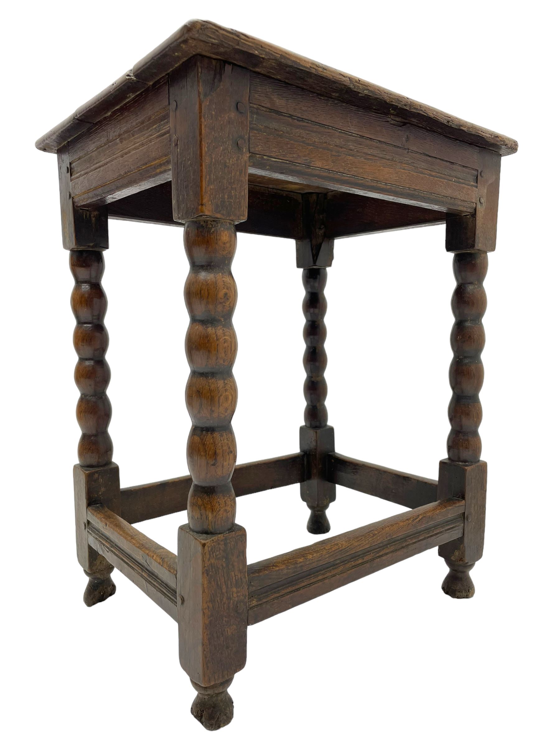 18th century oak joint coffin stool, moulded rectangular top over moulded frieze rails, raised on bobbin turned supports joined by moulded stretchers
