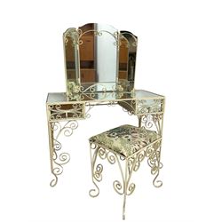 Cream painted scroll work wrought metal dressing table, fitted with two drawers and mirror top, together with matching triple mirror and stool