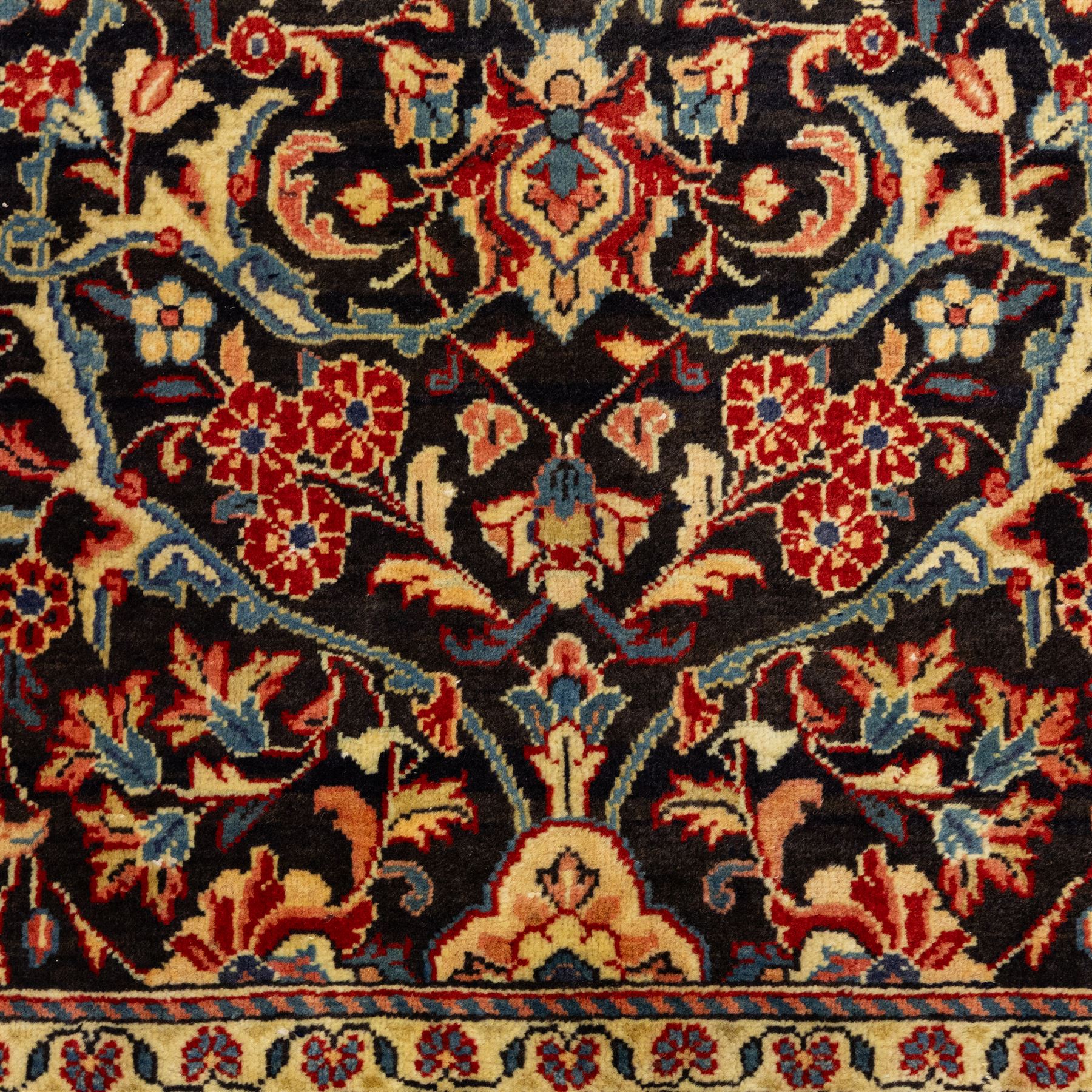 North West Persian Hamadan hand-knotted runner, deep navy field with central stylized medallion with pendants, surrounded by angular floral motifs, within an ivory border of repeating rosettes and stylized leaves, enclosed by guard stripes, fringe ends 