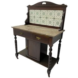 Edwardian walnut washstand, raised tiled back over marble table, fitted with single long drawer over panelled cupboard, on collar turned supports, brass and ceramic castors