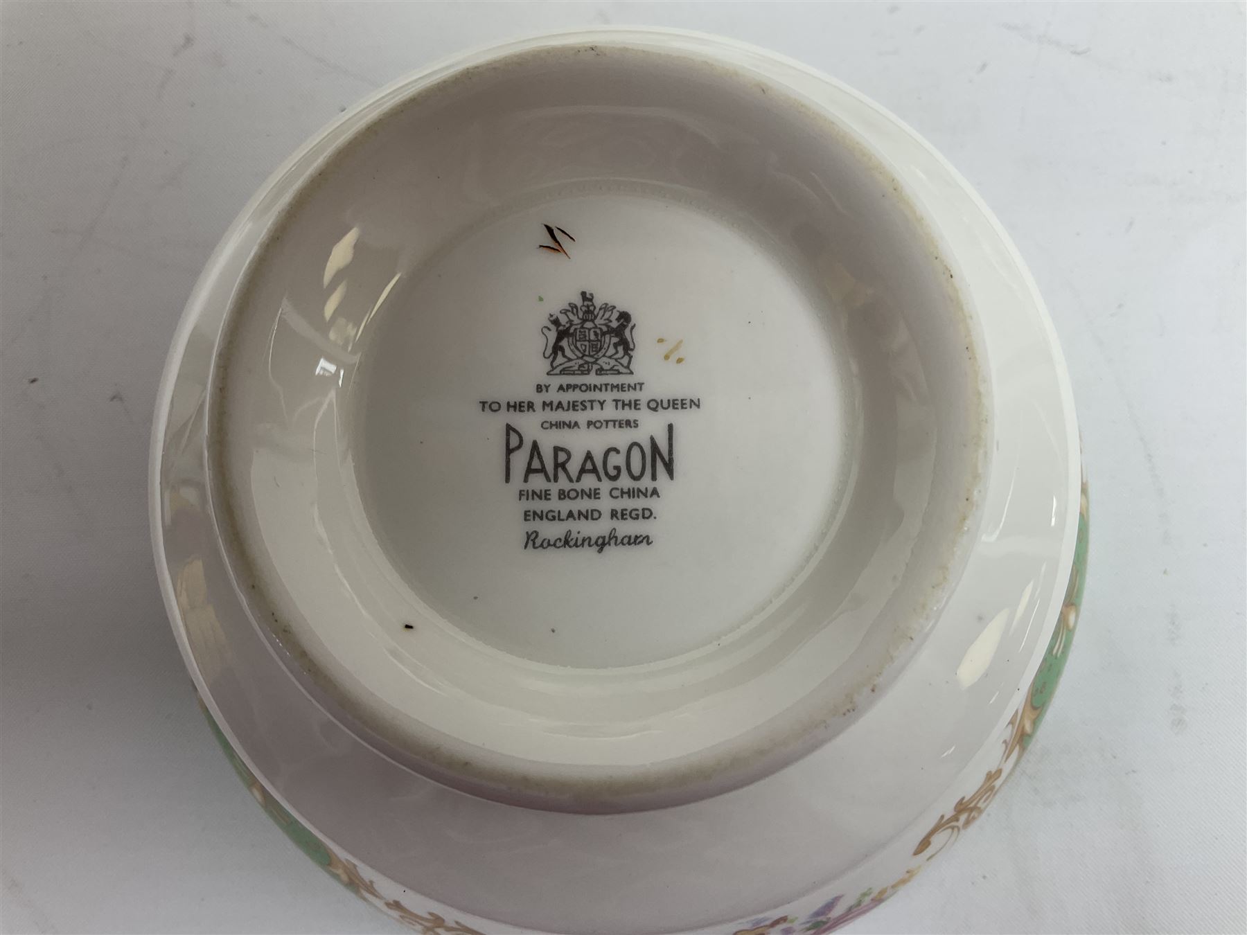 Paragon Rockingham pattern tea set, comprising teapot, coffee pot, four teacups and four saucers, six side plates, six dessert plates, cake plate, two open sucriers, and jug. 