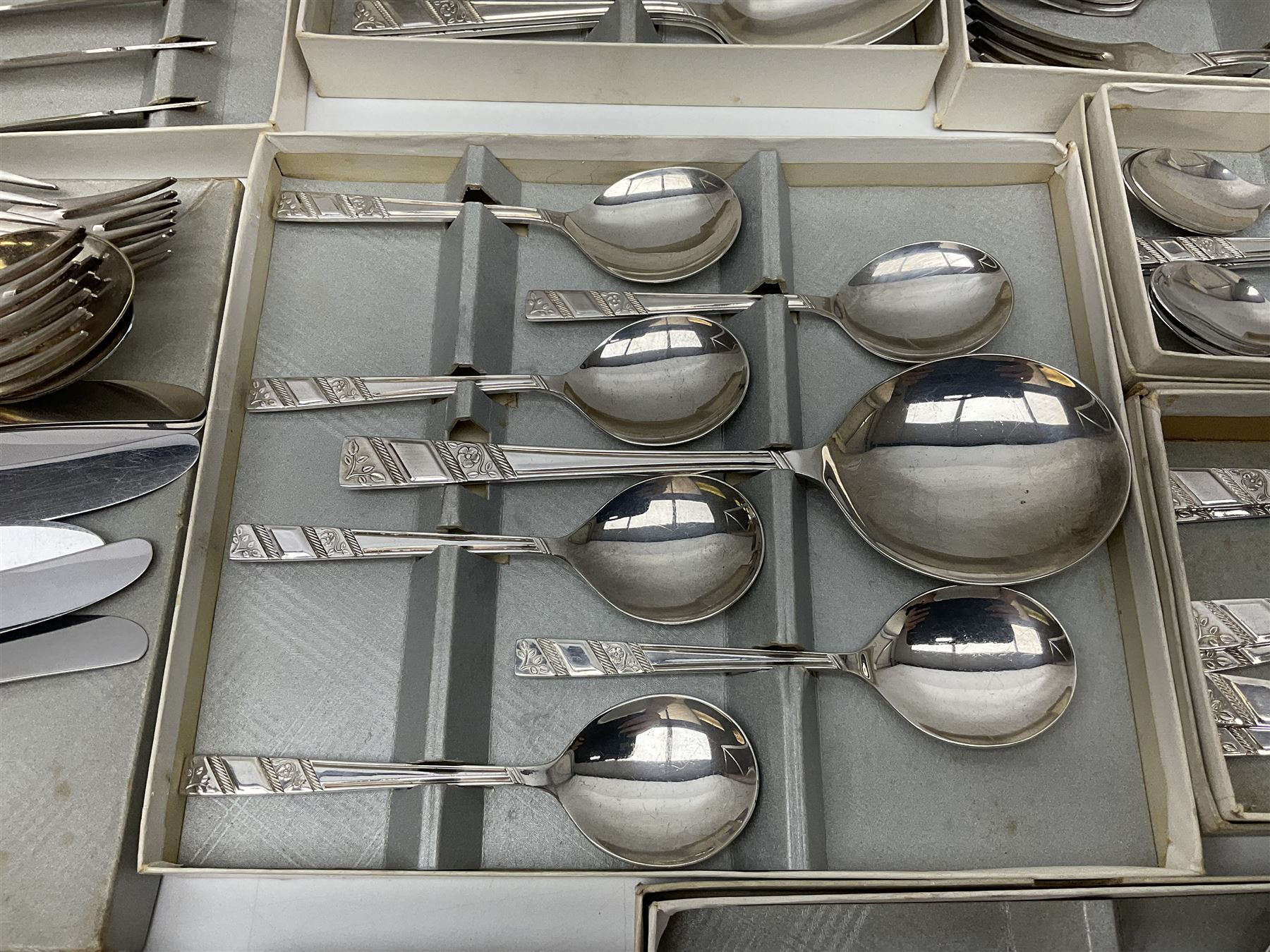 Viners Ltd silver plate Silver Rose pattern cutlery service for six place settings, to include butter knives, table knives and forks, soup spoons, dessert forks and spoons, tea knives, forks and spoons, two serving spoons and a seven piece fruit set, some boxed, missing table spoons