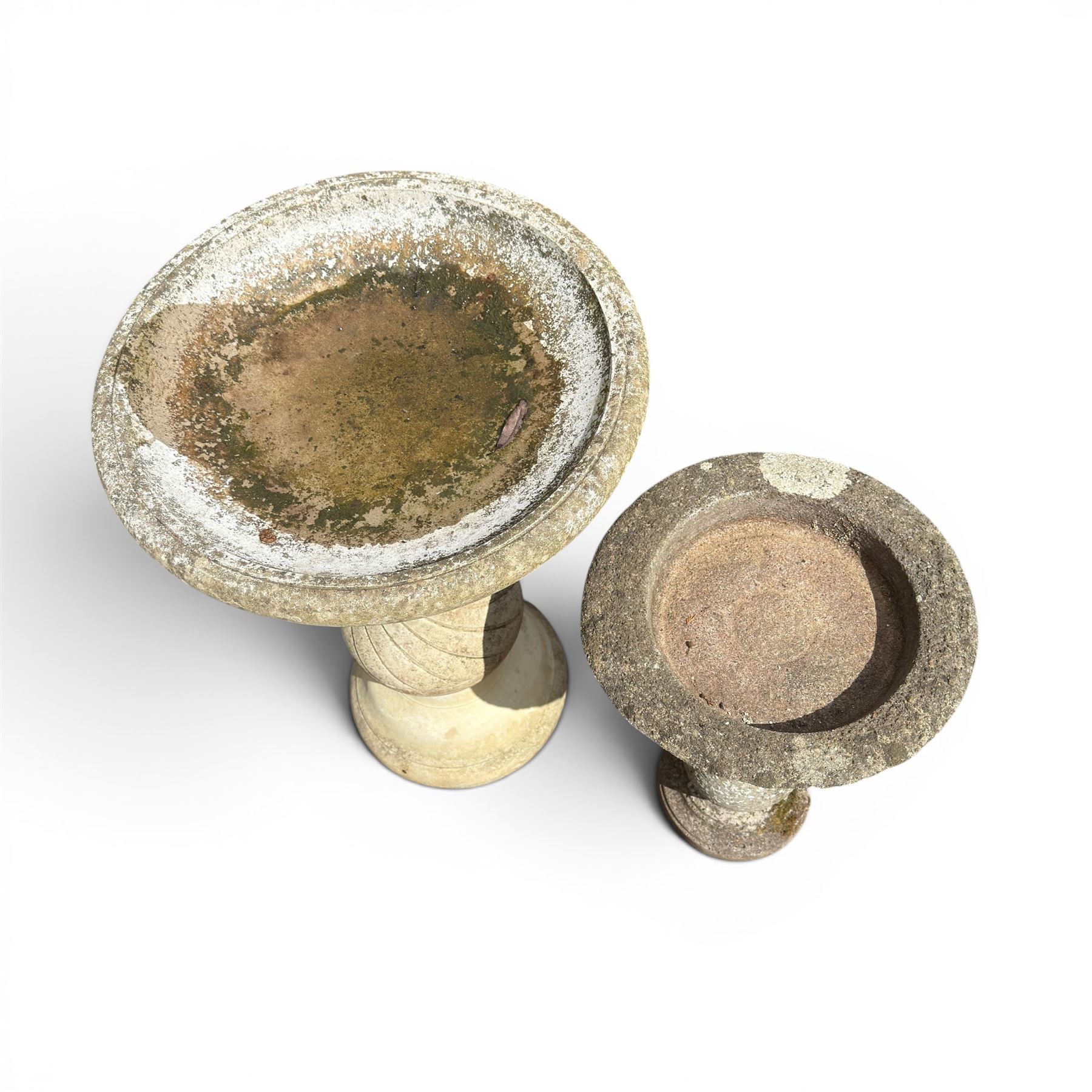 Large cast stone bird bath, circular bowl on spiral column; and a small three piece bird bath (2)