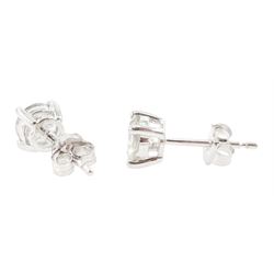 Pair of 18ct white gold round brilliant cut diamond stud earrings, stamped, total diamond weight approx 0.80 carat