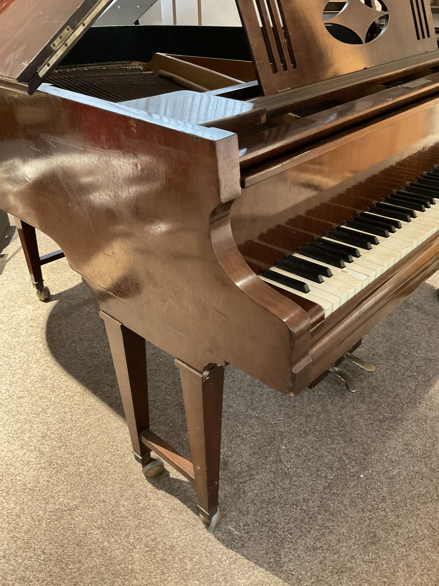 Buelhoff - 20th century German baby grand piano in a mahogany case, with an overstrung cast iron frame, original hammers, dampers, felts, stringing and action, sustain and sostenuto pedals, with an 88 note seven octave keyboard.

This item has been registered for sale under Section 10 of the APHA Ivory Act.