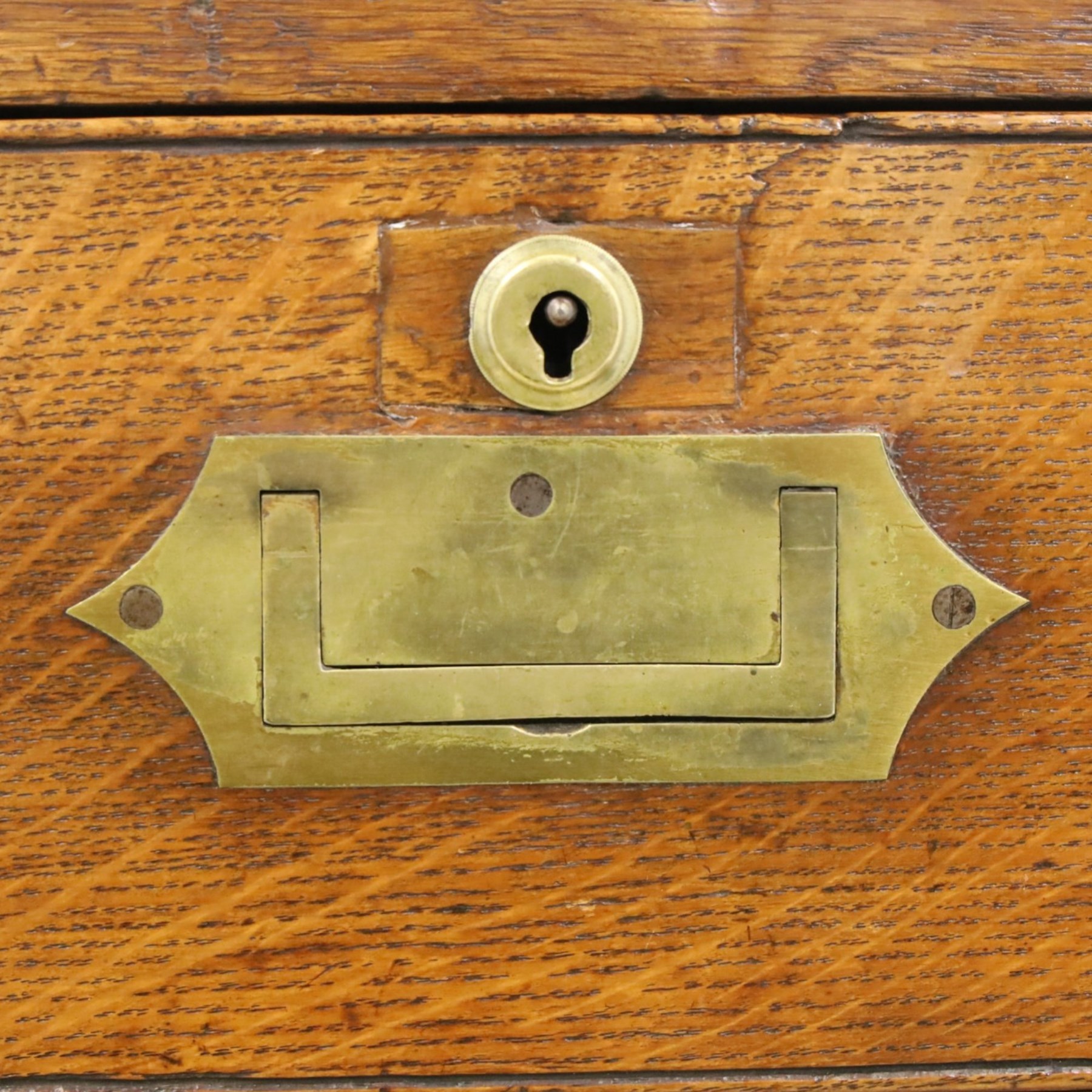 19th century brass bound mahogany campaign chest, with brass bound corners and edges, recessed brass handles, the upper section with two short over one long drawer, the lower section with two long drawers