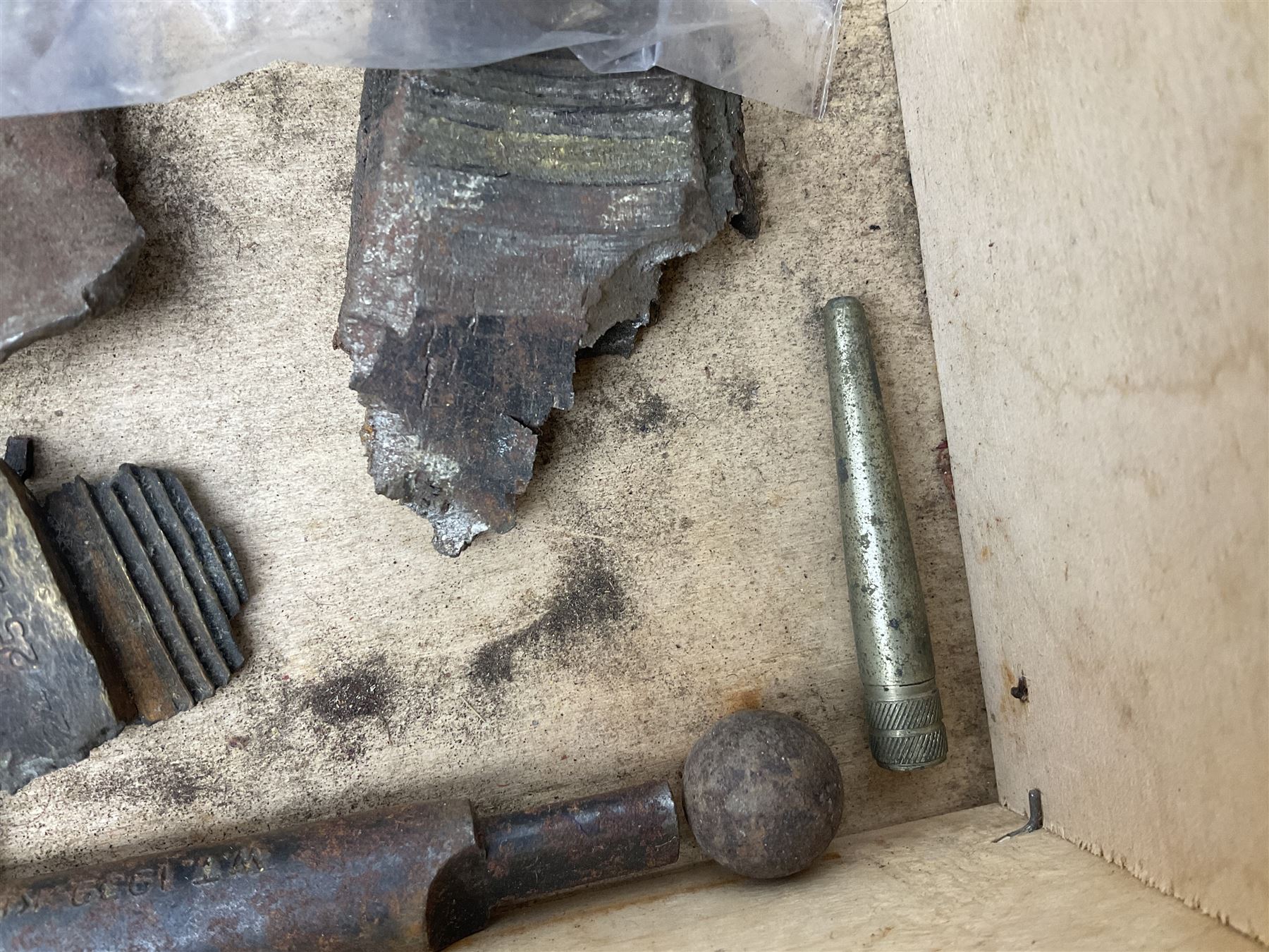 Small collection of WW2 shrapnel and German and British shell parts, most with manuscript details of where and when found including London, Leeds, Bristol, Linton-on-Ouse etc