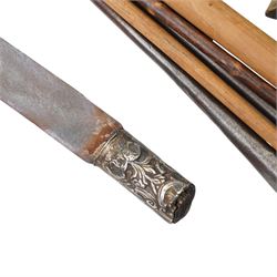 Nepalese kukri with skinning knives in leather scabbard, horse hair and leather sporran by Leckie Graham & Co 1900, Burmese sword, African spears and a military print