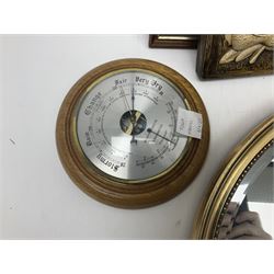 Two ceramic plaques by Richard Fisher, together with wooden plaques, artwork and three mirrors 