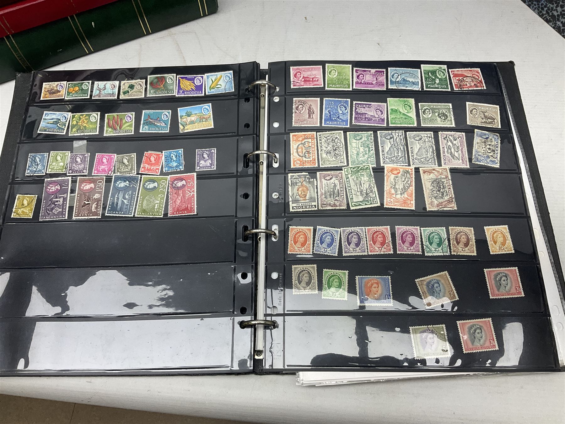 Stamps including Queen Victoria Queensland, modern Australia, King Edward VII Ceylon and Mauritius, South Africa, Gambia, Falkland Islands, Gold Coast, Ireland etc, housed in seven albums/folders and on loose album pages, in one box