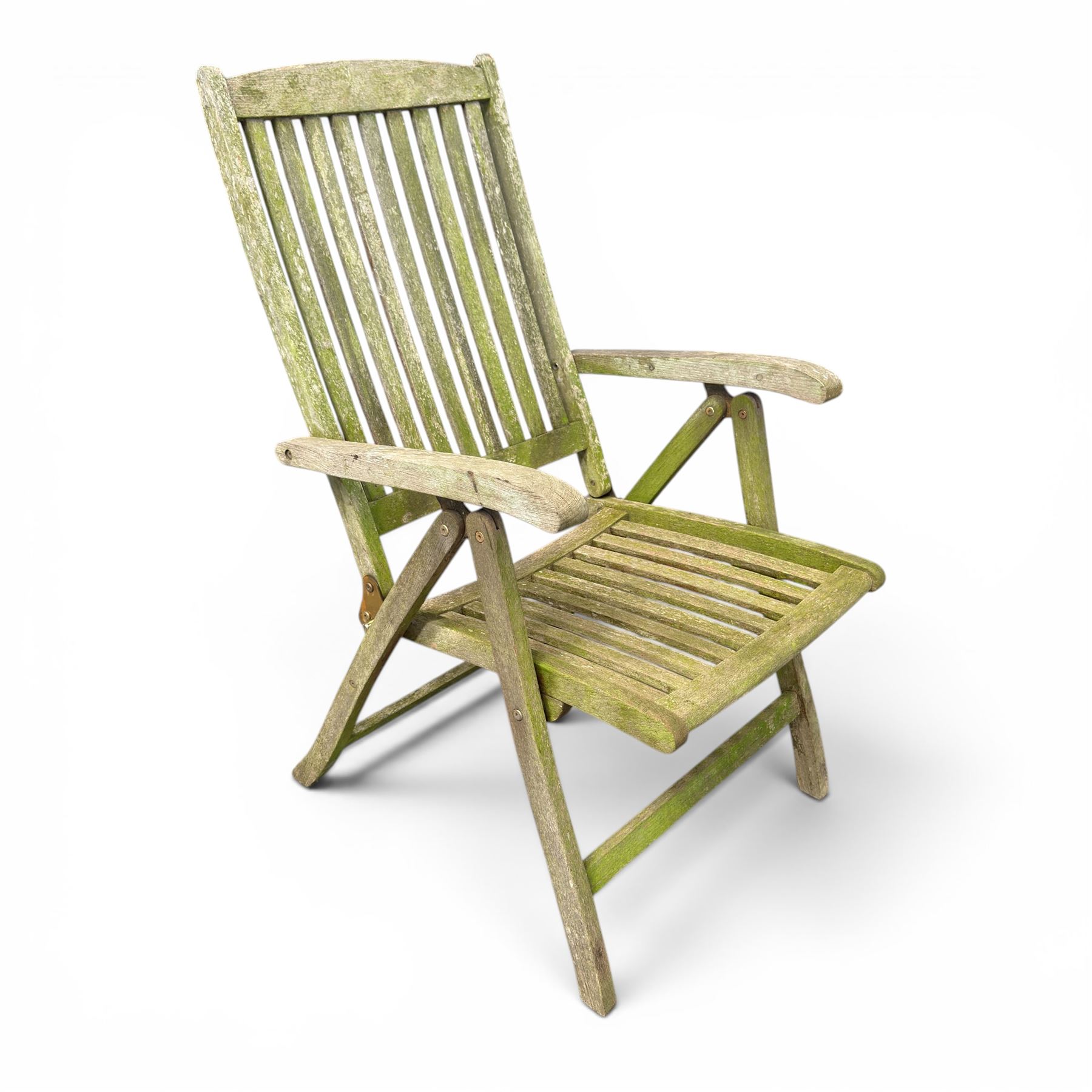 Five piece teak garden dining set, comprising circular folding table and four folding armchairs, with slatted seats and backs in a weathered finish