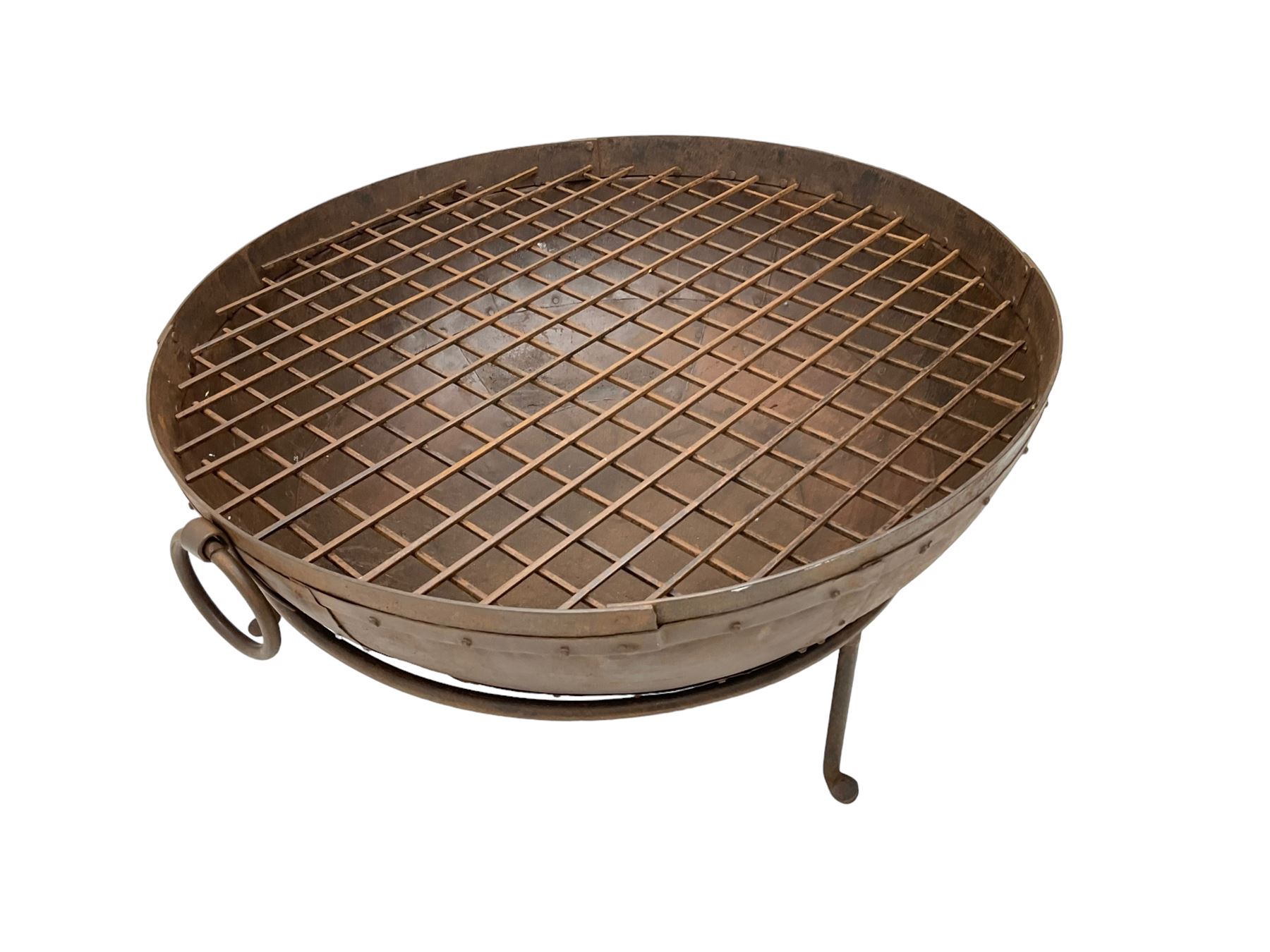Circular riveted iron fire pit, strapwork sides with twin handles on stand, with grate