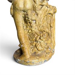 Composite garden statue group of Romeo and Juliet embracing in Medieval dress, surmounted on a naturalistic foliate base, in antique distressed glazed finish