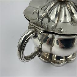 Art Nouveau silver plated claret jug, together with sugar bowl with a blue liner, jug H30cm