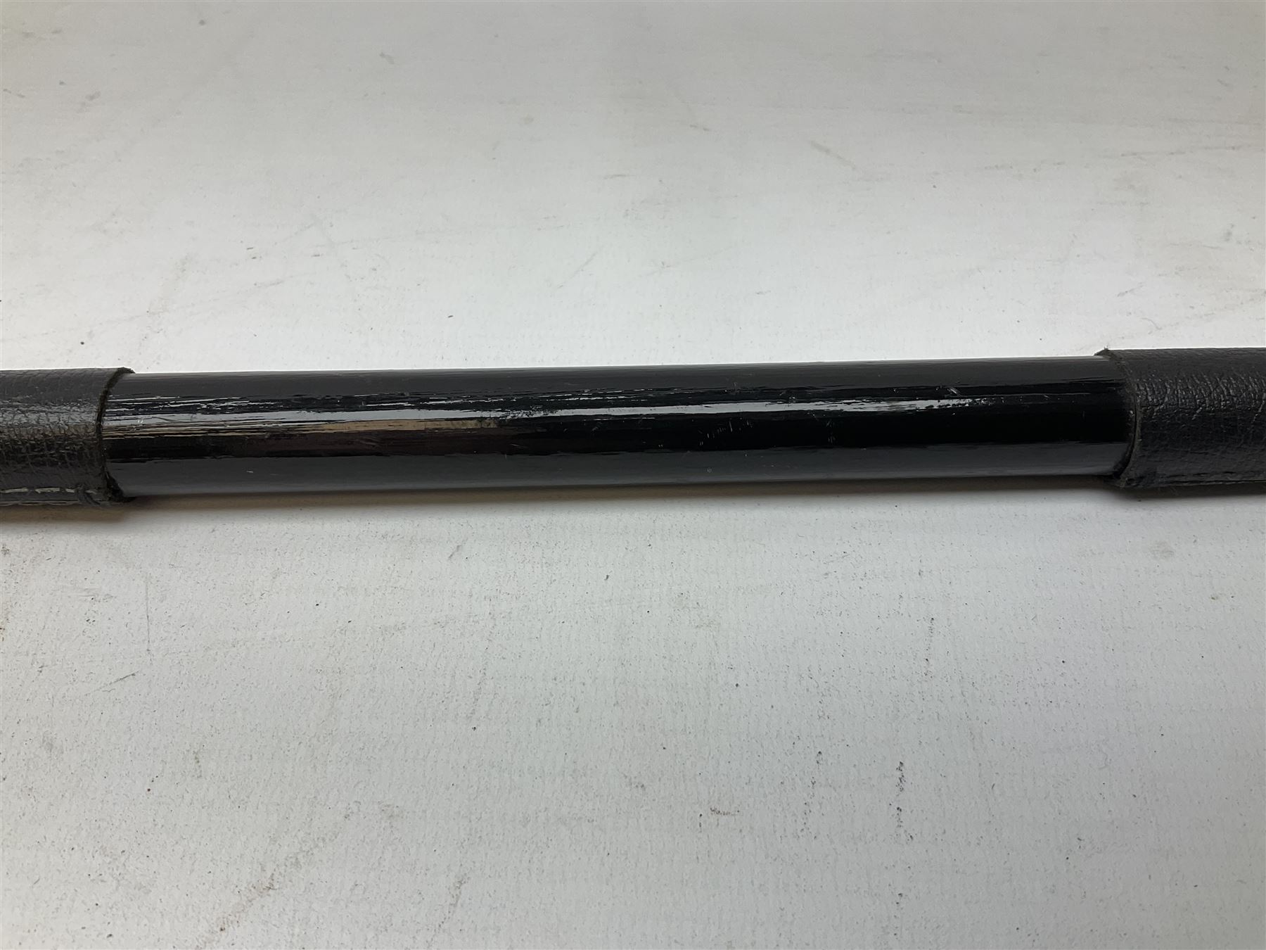 ‘The Metropolitan’ Police ebonised and black leather swagger stick, with combined whistle, 60cm