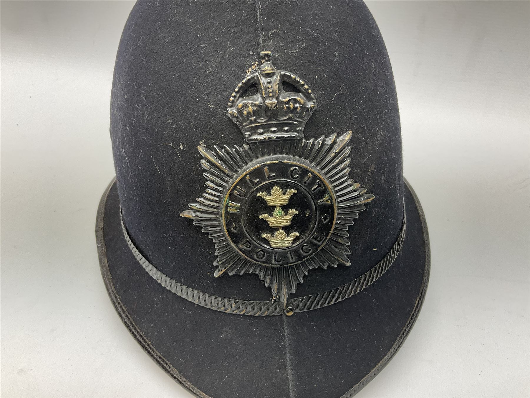  Hull City Police - Christys London helmet with king's crown night plate and a peaked cap (2)  