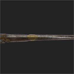 Middle Eastern percussion cap rifle, the 107cm  barrel with four brass bands and ramrod under, overall L143cm, together with another percussion rifle the 106cm barrel a copy of a 17th century Spanish barrel, complete with fake stamp, by vendors repute this rifle was confiscated from tribesmen in Kurdistan by police
Sold as an exempt item under Section 58 (2) of the 1968 Firearms Act, to be held as a curiosity or ornament