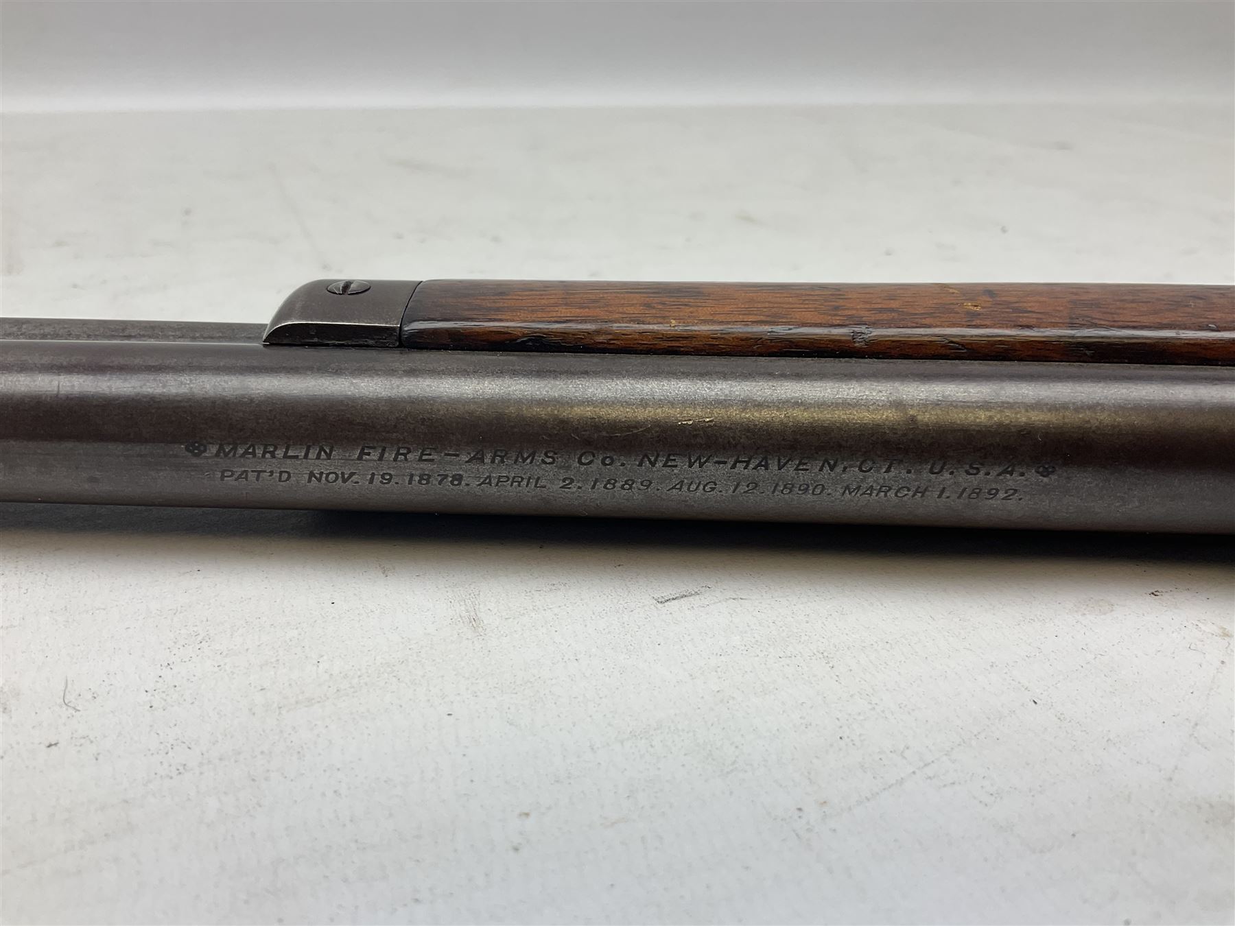 Marlin Firearms Co. USA 'Safety' .32 rim-fire rifle dated 1892, the 61cm barrel with magazine tube under, walnut stock with under lever cocking and crescent butt plate, serial no.153534, L103.5cm