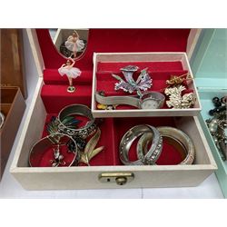 Collection of costume jewellery including enamel and marcasite flower brooch, two V Villani Italy bangles, clip on earrings, brooches, bangles, beaded necklaces and a Skagen wristwatch