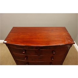  Victorian mahogany bow front chest of two short and three long drawers, turned wooden handles, on bun turned feet, W104cm, H109cm, D52cm  