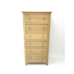 Light oak pedestal chest, six drawers, stile supports  