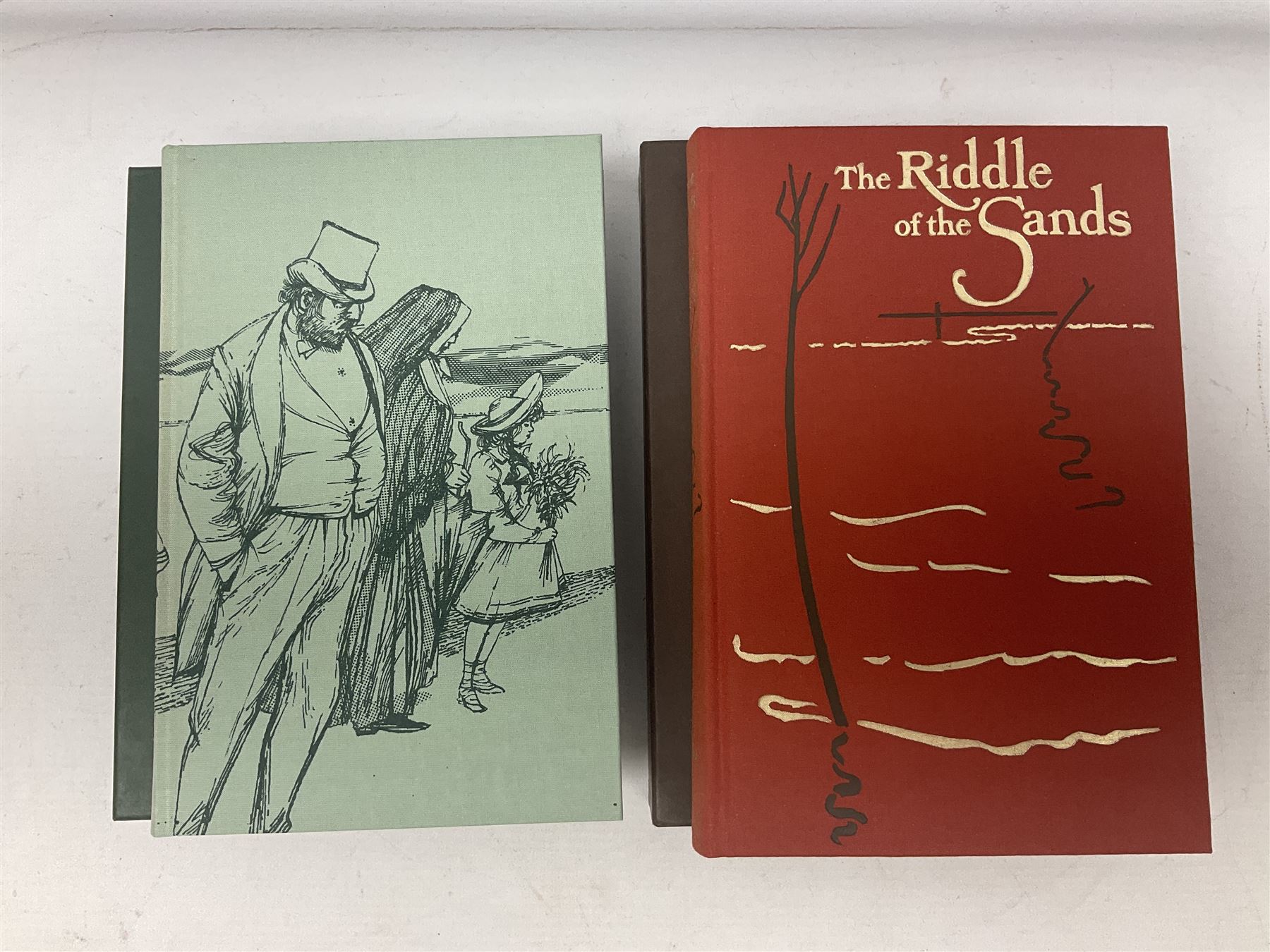 Folio Society; twenty two volumes, to include Vanity Fair, The Riddle of The Sand, The Necklace & Other Stories, Under Milk Wood, Barnaby Rudge etc 