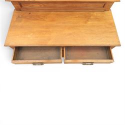 Edwardian oak serving table, raised panelled back over moulded rectangular top, fitted with two frieze drawers with brass drop handles, fluted front uprights, on turned supports united by potboard undertier