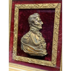 Victorian gilt metal portrait relief plaque of Field Marshal Sir Arthur Wellesley, 1st Duke of Wellington, after Peter Rouw (1770-1852), late 19th century, portrayed looking to sinister, in full military costume and draped around the truncation, mounted on red velvet in a deep stepped gilt frame with outer simulated rosewood frame 43 x 38cm overall