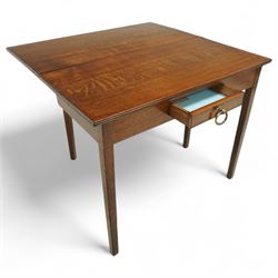 Early 20th century oak side table, rectangular top over single frieze drawer with brass ring handle, raised on square tapering supports