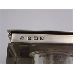 1930s silver mounted glass inkwell, of square form, the silver lid with engine turned decoration and engraved initials, hallmarked Adie Brothers Ltd, Birmingham 1937, H4.7cm