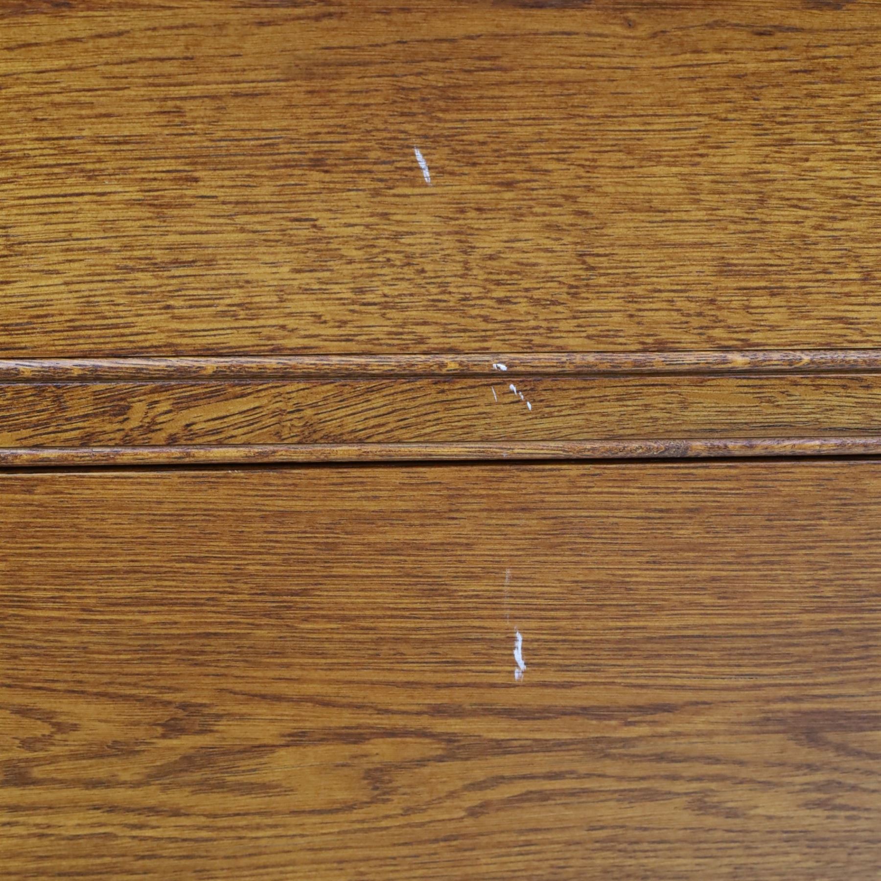 Cabinet-made oak chest, fitted with four soft-close drawers, brass swan neck handles and pierced backplates, on bracket feet