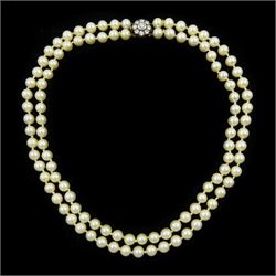 Double strand cultured cream / white pearl necklace, with 9ct gold and silver round cut di...