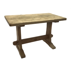 'Acornman' oak coffee table, rectangular adzed top on shaped end supports connected by pegged stretcher, by Alan Grainger of Brandsby, 61cm x 36cm, H39cm
