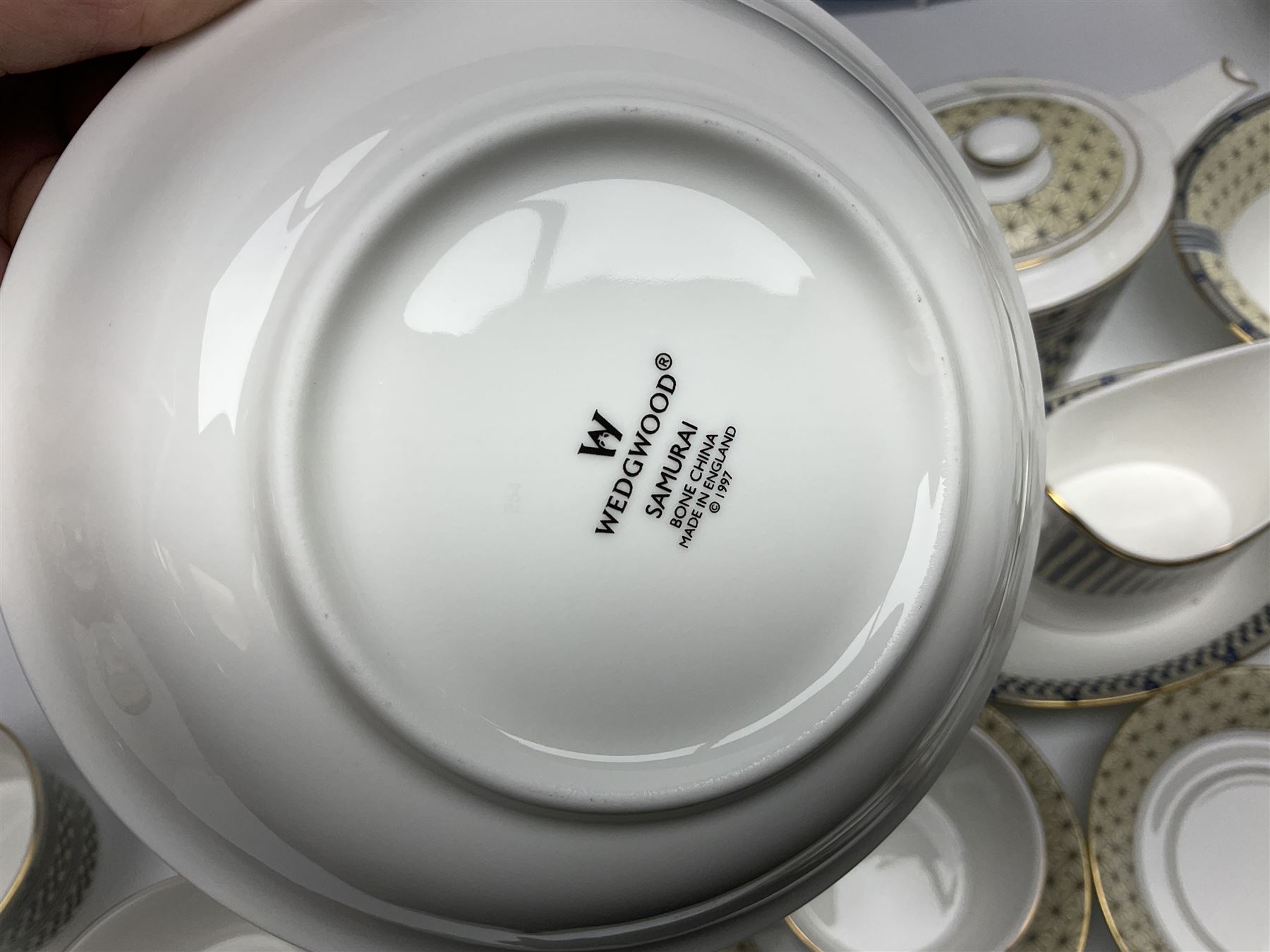 Wedgewood Samurai pattern, part tea and dinner service, to include teapot, open sucrier, milk jug, six cups and saucers, six dinner plates, six soup bowls, covered twin handled service dish, sauce boat and saucer etc (46)  