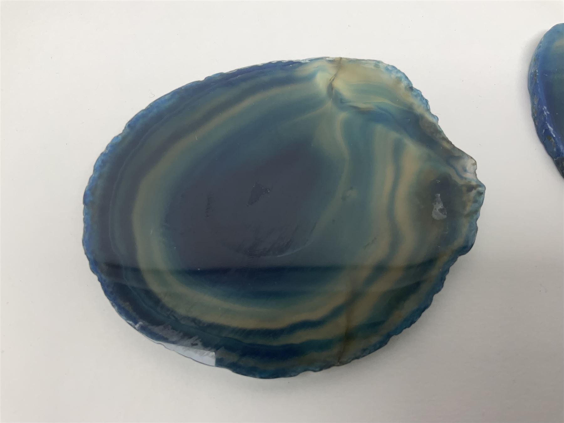 Five blue agate slices, polished with rough edges, H9cm, L7cm