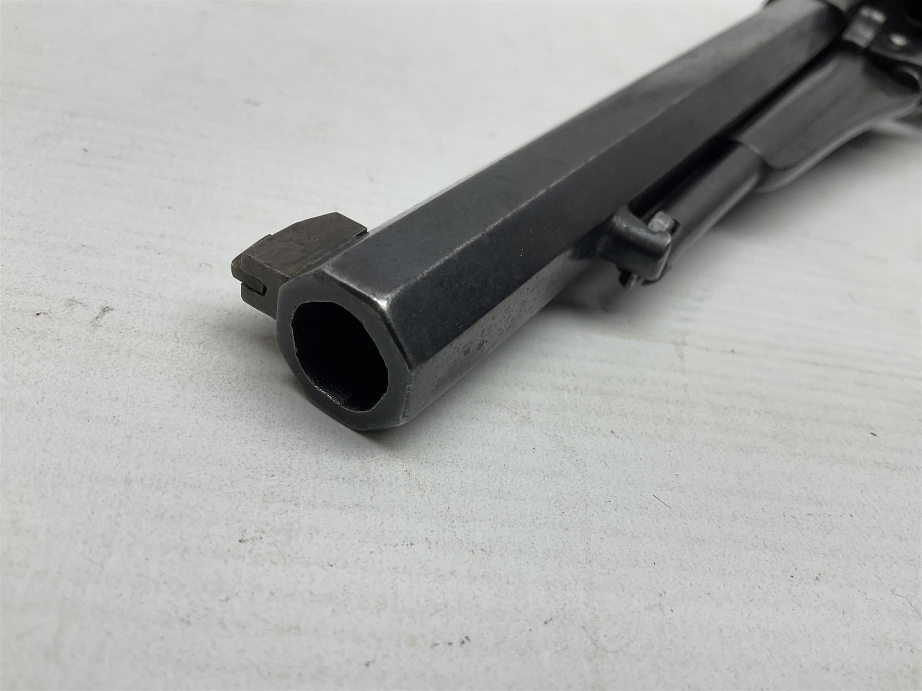 Unmarked Spencer & Rogers type Remington style .44 cal. six-shot percussion revolver, 20cm octagonal barrel with loading lever under, brass trigger guard and two-piece wooden grip L37cm overall; together with a framed watercolour by Alan J. Gray dated 2009 entitled 'The Remington .44 Calibre 1861 Navy Revolver'  19 x 42cm (2)