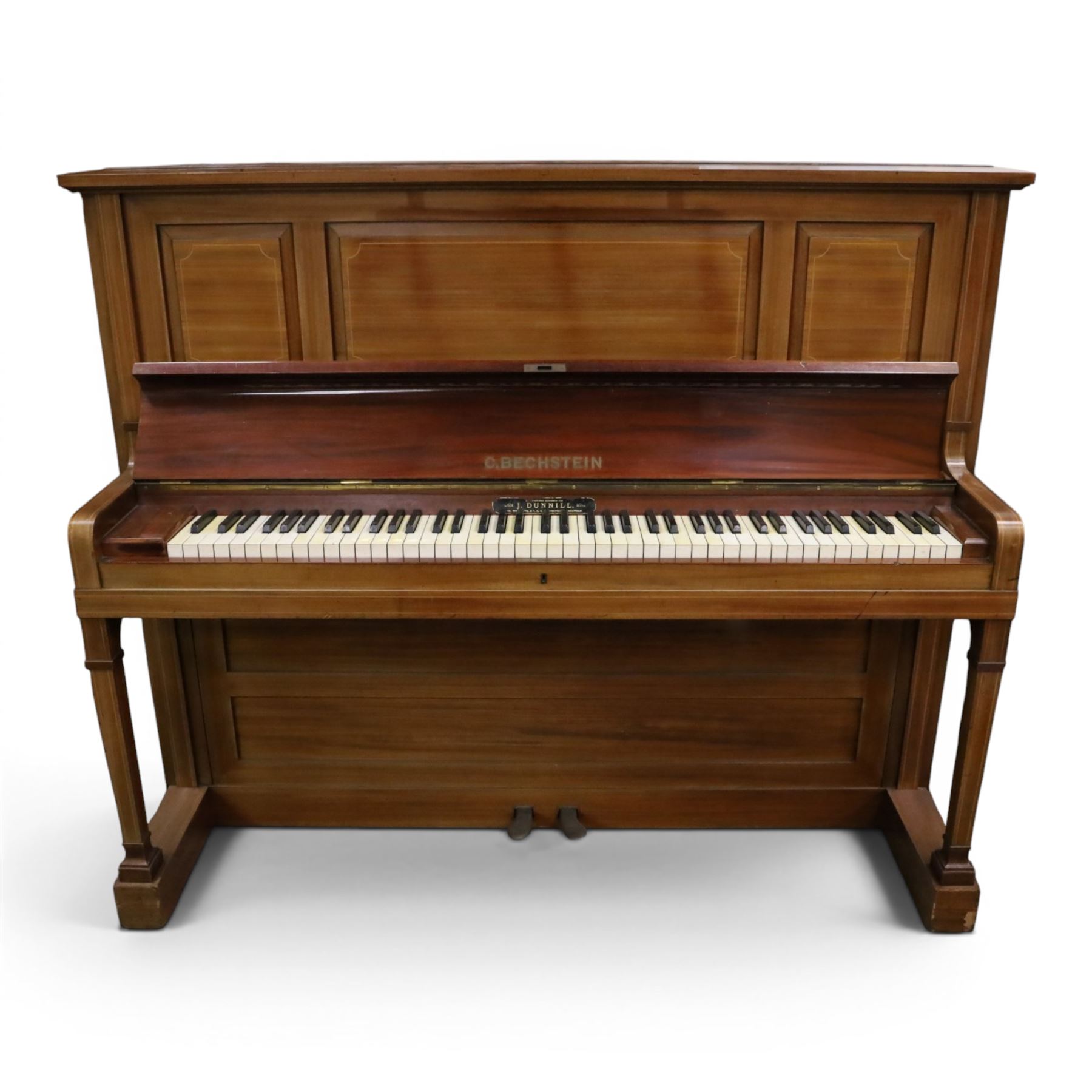 Edwardian C. Bechstein mahogany cased upright piano, with ivory keys and two pedals, manufactured expressly for J Dunnill Wakefield, serial no. , H123cm, W150cm