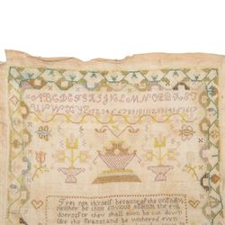 Early 19th century sampler worked by Mary Audley aged 15 years dated 1818, depicting alphabet and numbers above a religious passage, bordered by animals, buildings and insects, unframed, H45cm