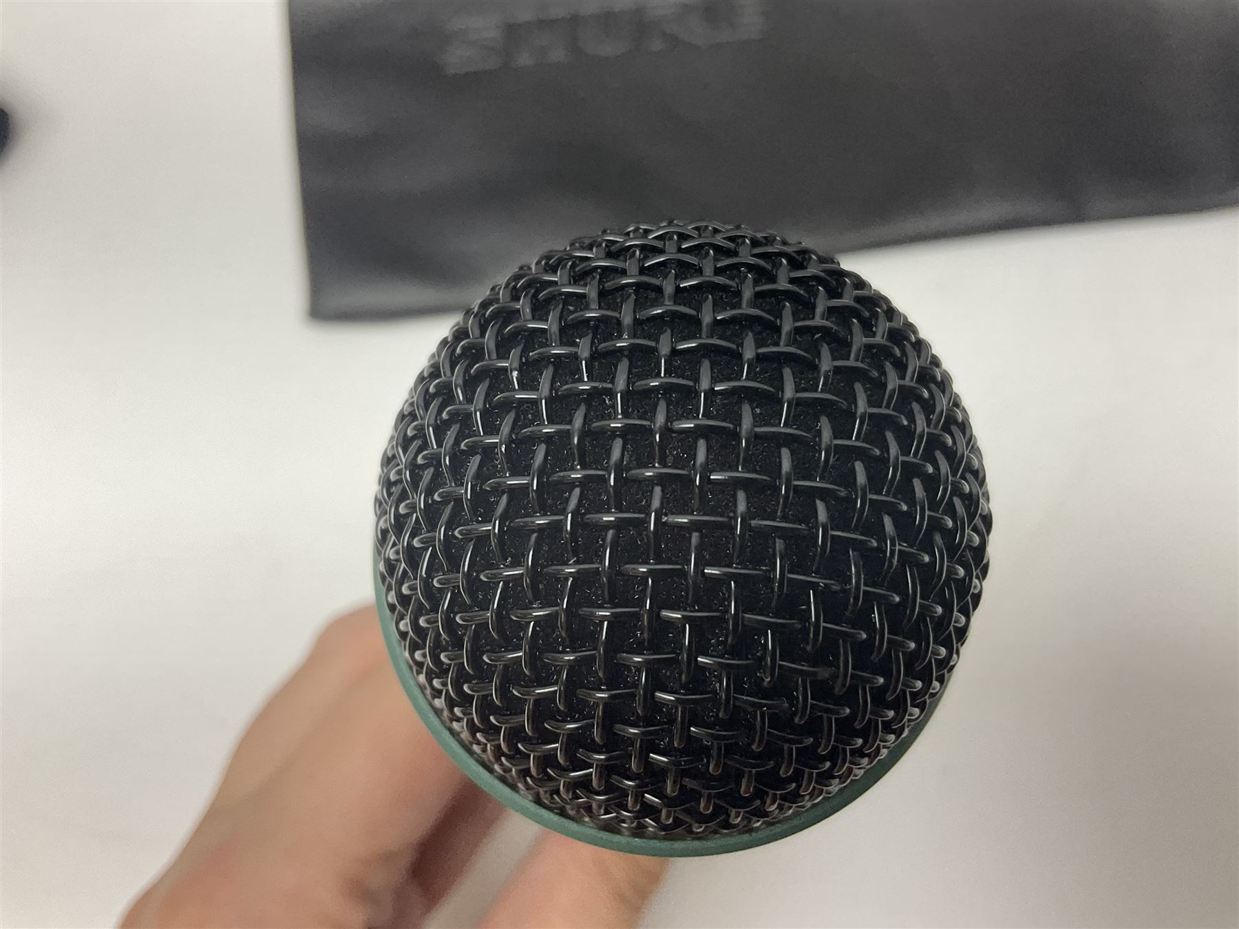 Vintage pair Akai ADM-8 Dynamic microphones; AKG D880 Dynamic microphone; cased; and Shure Betagreen BG1.0 vocal microphone; boxed; all with cables (4)