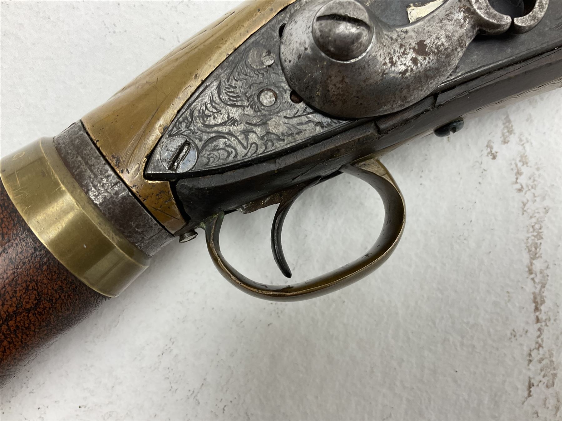 Late 18th century 7.2mm (approx. .28 calibre) Girandoni system single shot reservoir air rifle, the 62cm steel barrel with swivelling two-leaf rear sight, brass breech decorated with a sunburst and lever opening top loading, engraved steel lock-plates marked 'S. Gaskell' to the right side underneath the cocking lever, brass trigger guard,  leather covered steel butt reservoir of tapering conical form with brass ferrule and walnut fore-stock with horn mounts L107cm overall