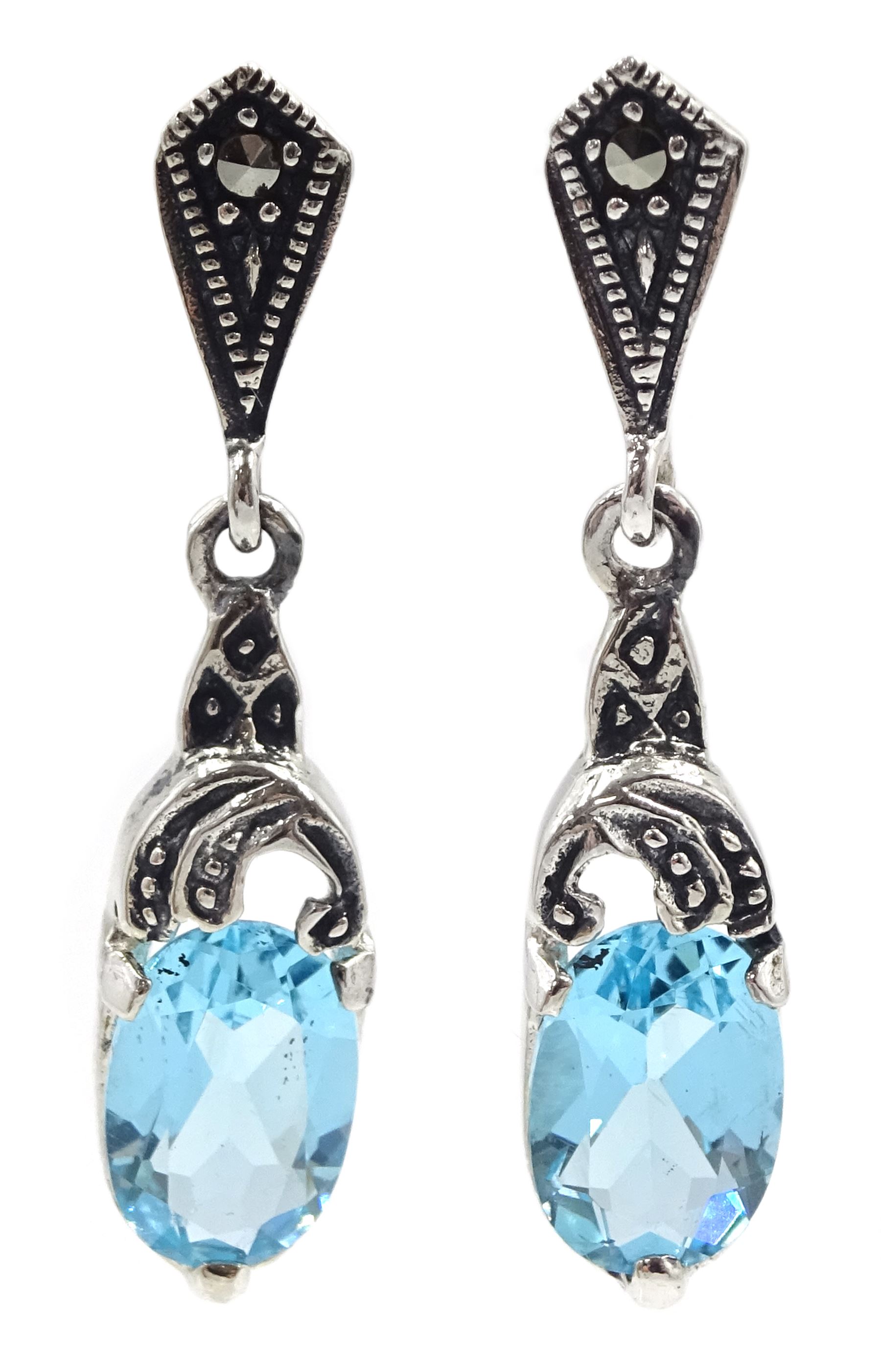 Pair of silver blue stone and marcasite pendant stud earrings, stamped 925 